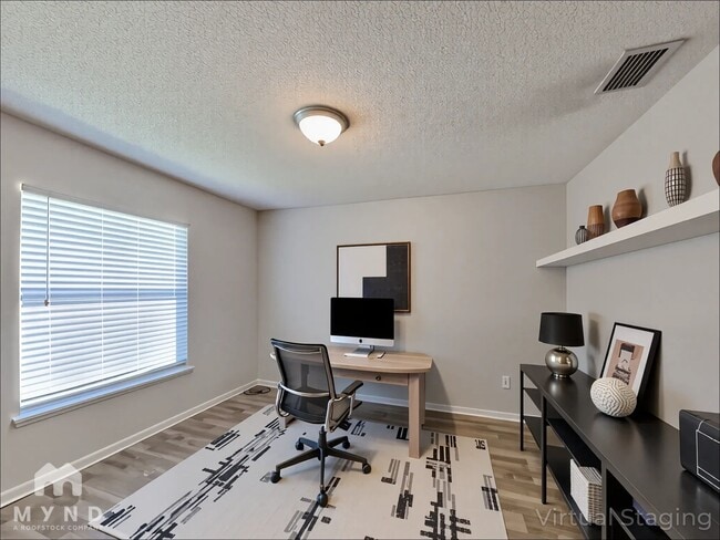 Building Photo - 7637 Invermere Blvd N