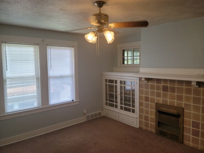 Dining Room with great built-ins and decorative fire place - 271 Center Ave