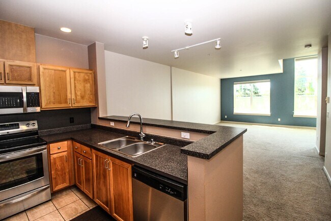 Building Photo - Downtown Redmond.  Secured Garage parking ...