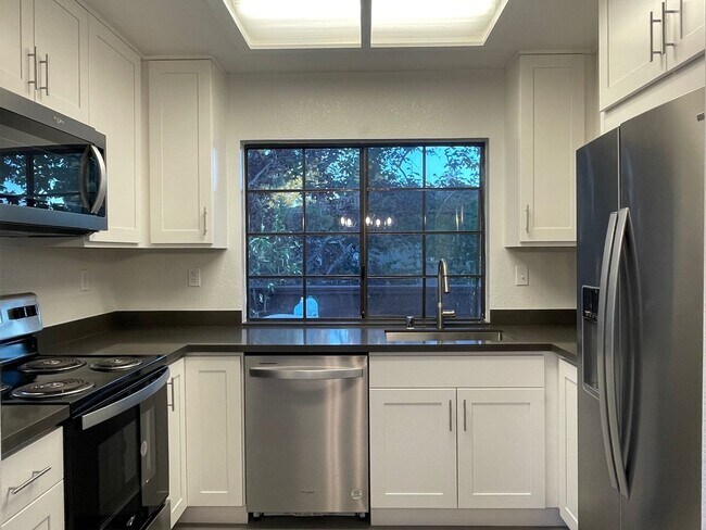 Building Photo - Welcome home! A spacious and fully remodel...