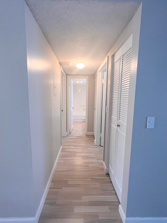 Hall towards bath and bedrooms. - 1024 SE 3rd Ave