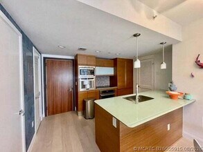 Building Photo - 5875 Collins Ave