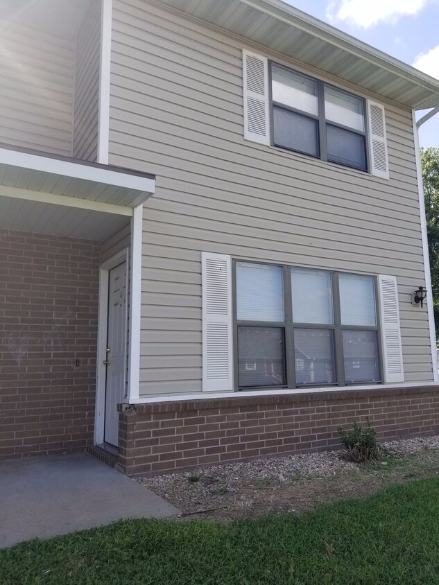 Primary Photo - Townhome with a fireplace