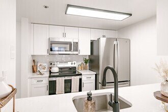 1BR, 1 BA - 768SF - Kitchen - North X Northwest Apartments