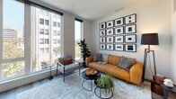 Located at 1314 Franklin Street in the heart of Oakland, CA, this modern single-floor residence offers a well-curated living environment with contemporary design throughout. The open-concept layout is anchored by a bright living area featuring floor-to-ceiling windows that flood the space with natural light and frame views of the surrounding urban skyline. The living room is appointed with hardwood-style flooring and offers ample wall space, ideal for displaying art.

The galley-style kitchen is efficiently designed with stainless steel appliances, including a range, microwave, and dishwasher, complemented by sleek lower cabinetry in a light finish and warm wood upper cabinets. White quartz countertops and under-cabinet lighting complete the clean, modern aesthetic.

The bedroom is a calm, well-proportioned retreat featuring a closet and neutral tones that create a restful ambiance. The bathroom includes a full soaking tub with a tiled surround, offering a clean and functional design.

An entry corridor with built-in wall hooks provides convenient storage upon arrival. Throughout the residence, hardwood-style flooring, recessed lighting, and a cohesive neutral palette tie each space together, resulting in a polished and inviting urban home.