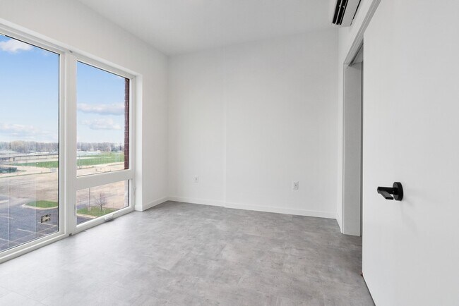 1 Bedroom Model A12 Living Room - The Common Place Apartments