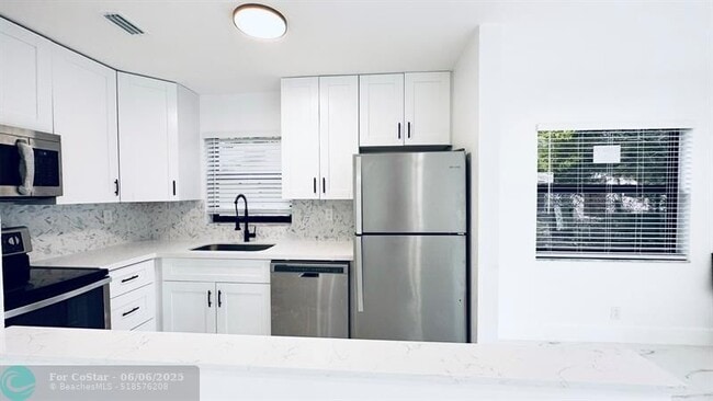 Building Photo - 1460 NW 22nd Ct