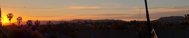 The view from the porch. The Hollywood sign in Griffith Park Observatory to the right all the way to - 1342 Waterloo St