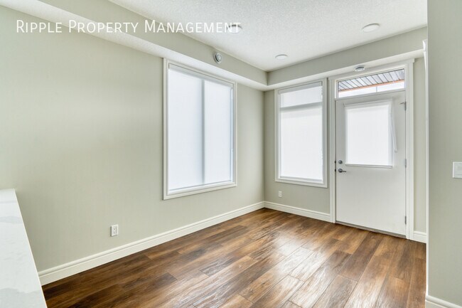 Photo du bâtiment - COZY 1 BED/ 1 BATH TOWNHOUSE IN THE COMMUNITY OF SADDLE RIDGE