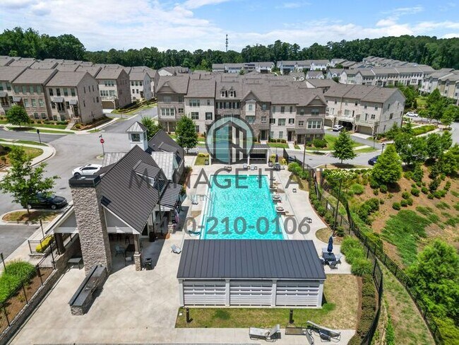 Foto del edificio - Modern 3-level Townhome featuring 4 bedrooms and 3 1/2 baths