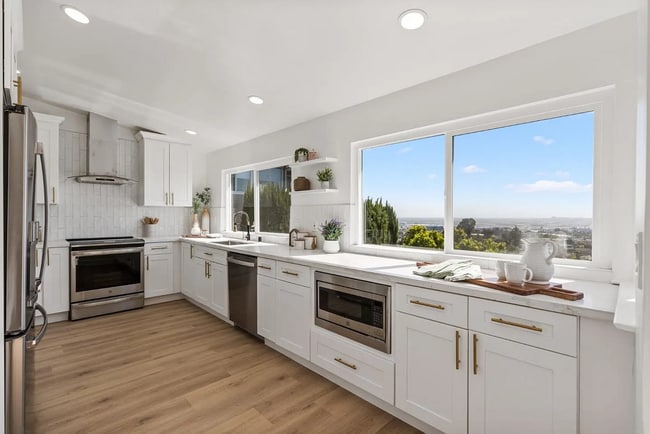 Building Photo - "Remodeled - Charming 3-Bed Sanctuary with...