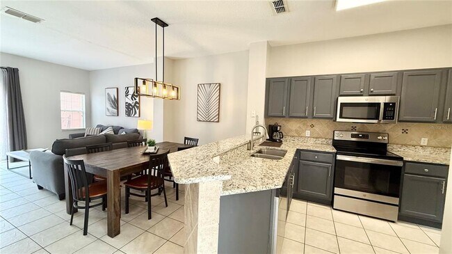 Foto del edificio - 8517 Bay Lilly Loop