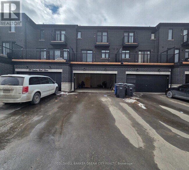 Photo du bâtiment - 57 Camino Real Dr