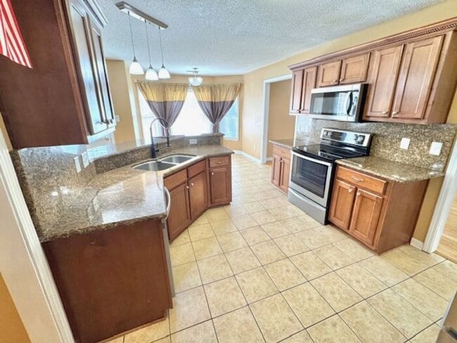 Foto del edificio - MOVE IN SPECIAL!!! Now leasing a 4-bedroom 2.5 bath home in Arlington. Great location and great s...