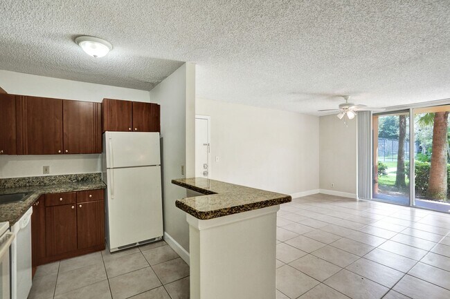 Building Photo - Updated 2 Bed, 2 Bath 1st Floor Condo with...