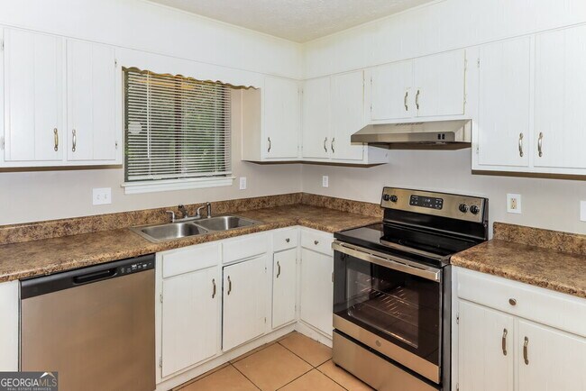 Foto del edificio - 8912 Saddlewood Dr