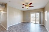 Located at 2600 Sablewood Dr in Bakersfield, California, this well-appointed two-bedroom, two-bathroom single-story home offers a comfortable and functional layout. The living room features wood-look plank flooring, neutral warm-toned walls, a ceiling fan with light fixture, and a sliding glass door that opens to a private patio, filling the space with natural light and providing easy outdoor access.

The combined dining and kitchen area is thoughtfully designed with rich wood cabinetry, granite countertops, a double-basin sink, stainless steel appliances including a full-size refrigerator, and tile flooring — offering both style and practicality. A pantry provides additional storage.

Both bedrooms are generously sized, each featuring wood-look flooring, ceiling fans, and ample closet space. The primary bedroom includes two closets, while the secondary bedroom offers a walk-in closet. The two bathrooms are finished with tile flooring, granite-topped vanities, and full tub-shower combinations.

A dedicated laundry area houses a stacked washer and dryer unit alongside a tankless water heater, adding convenience and efficiency. A connecting hallway ties the layout together seamlessly, creating a cohesive and easy-to-navigate floor plan throughout this inviting Bakersfield home.