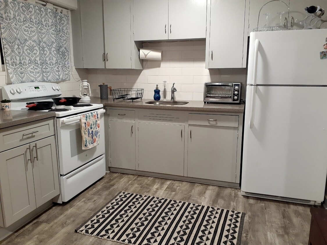 Kitchen with Fridge - 946 Waiakamilo Rd