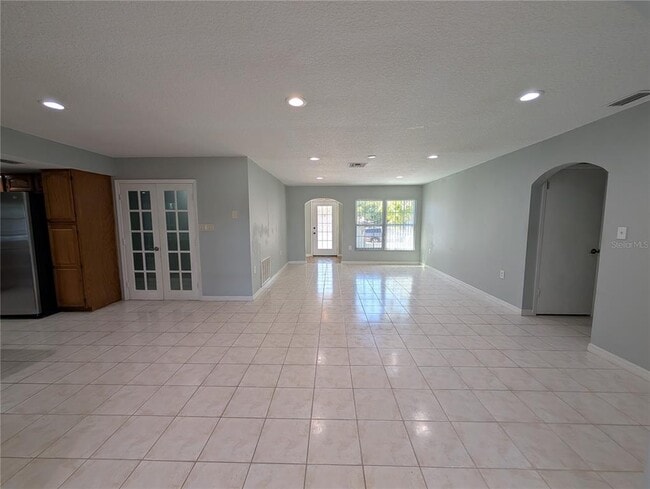 Building Photo - 6947 Bottle Brush Dr