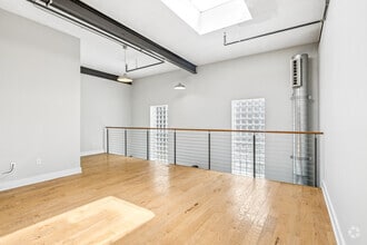 2BR, 1.5BA - 1,500SF - Living Room - The Button Lofts