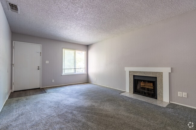 1BR, 1BA - 640SF - Living Room - Walnut Wood Apartments