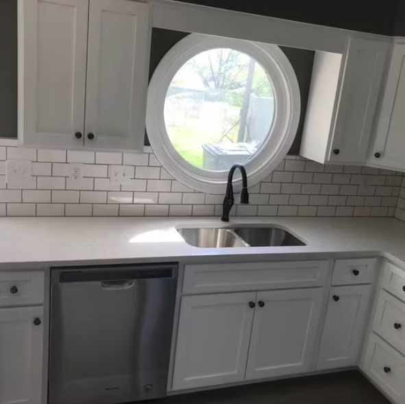 New granite countertops and unique window! - 1227 46th St