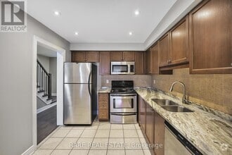 Building Photo - 7360-7360 Zinnia Pl