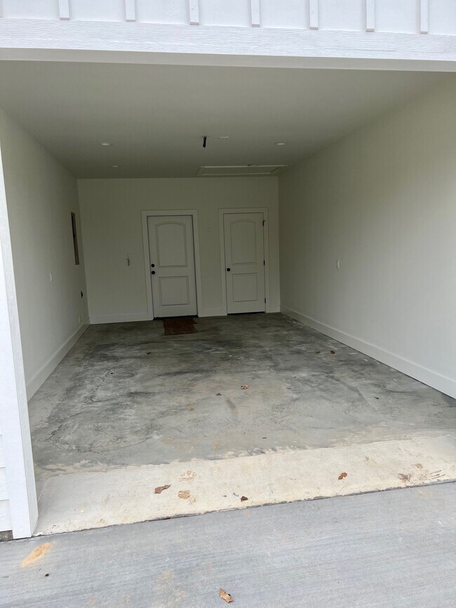 1 car garage (garage doors coming soon!) - 203 Craig St