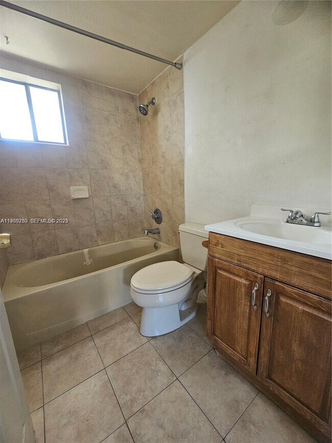 Building Photo - 5460 W 21st Ct