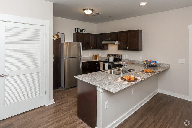 2BR, 1BA - 876SF - Kitchen - Reserve at Palestine 55+