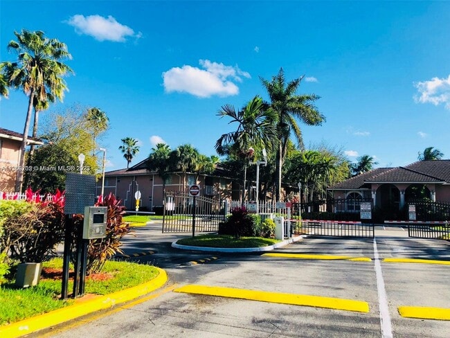 Building Photo - 3221 Sabal Palm Manor