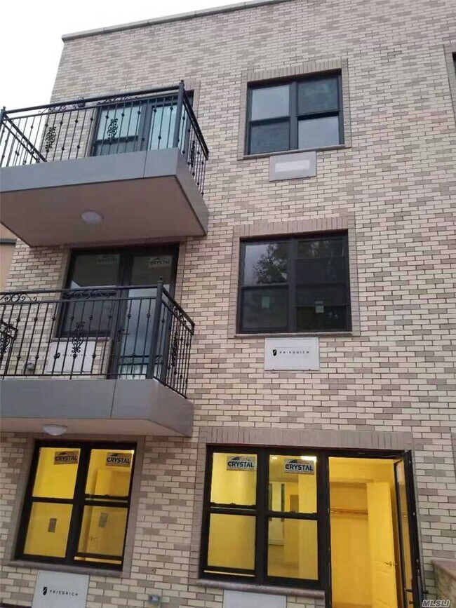 Building Photo - 161-12-161-46 46th Ave