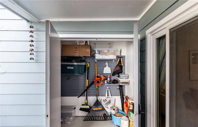 Building Photo - Executive Bixby Village condo with gorgeou...