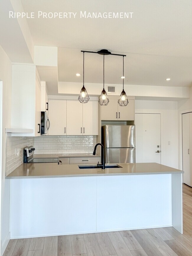 Photo du bâtiment - INCREDIBLE 2 BEDS/ 2 BATHS CONDO | SPRINGBANK HILL LIVING