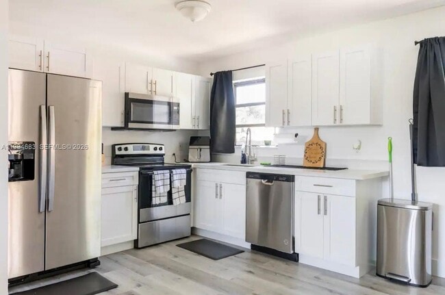 Building Photo - 1200 NW 18th Ct