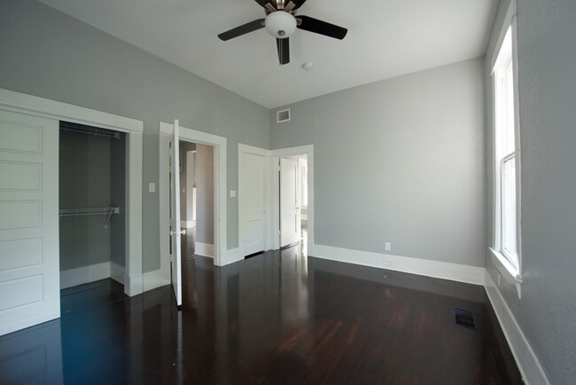 Large back bedroom with 2" blinds and black out curtains. - 714 Gillespie St