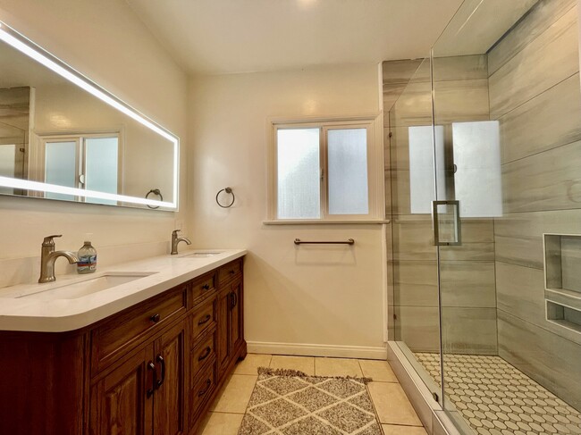 Double sink designer vanity with walk in shower - 610 N Horne St