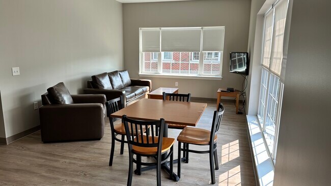 Sala de estar compartida - Arcadia Apartments