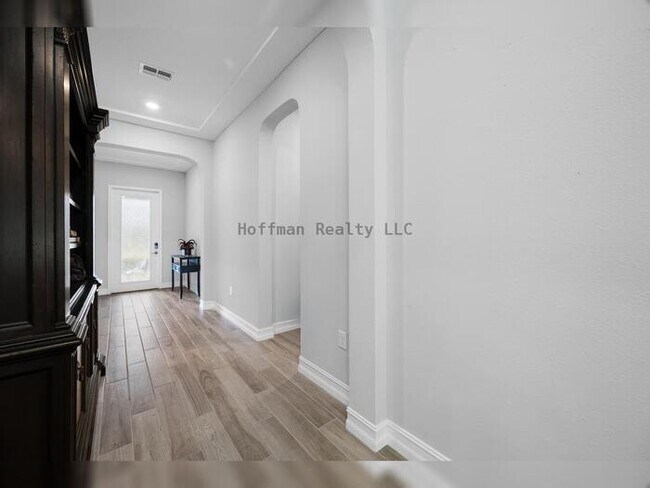Building Photo - Luxury 4-Bedroom Home with 3-Car Garage in Gated Promenade at LakePark
