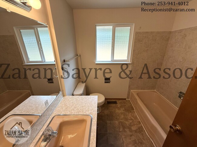 Building Photo - 215 - Perfect Location! Three Bedroom Charmer