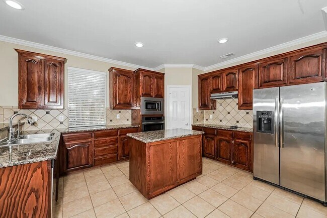 Foto del edificio - 7035 Moss Lk Ct