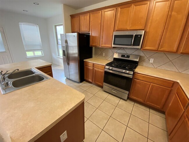 Foto del edificio - 5118 Big Meadow Ln