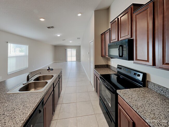 Building Photo - 5029 Golden Fig Ln