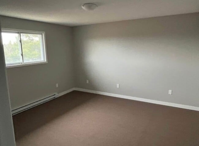 Photo du bâtiment - 10 John T. Mcmillan Av