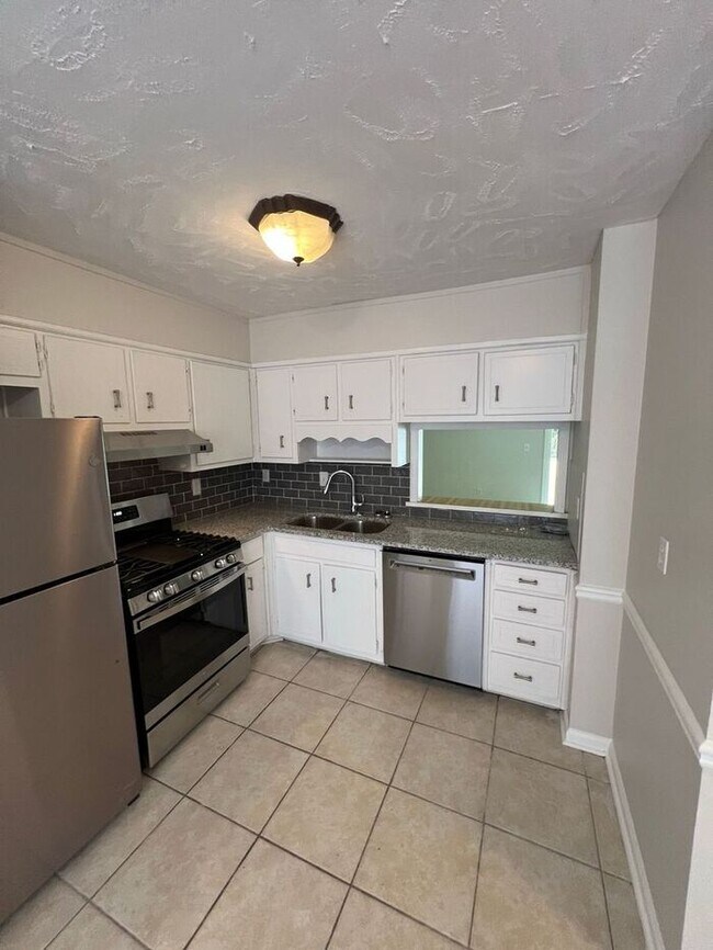 Foto del edificio - NOW READY! Cozy townhome 2 bedroom 2.5 bathroom duplex in Lawrenceville!