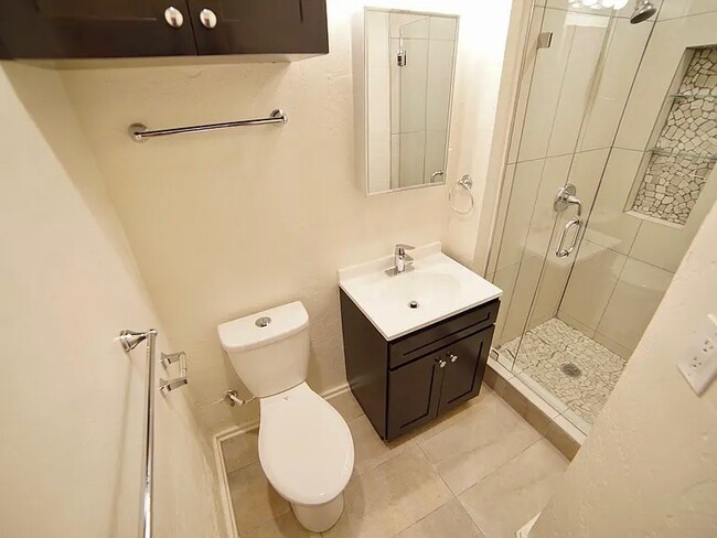 Bathroom with walk in shower. - 3036 E St