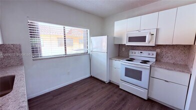 Building Photo - 6370 W 27th Ct