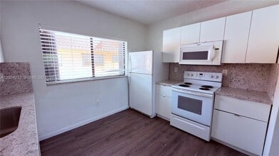 Building Photo - 6370 W 27th Ct