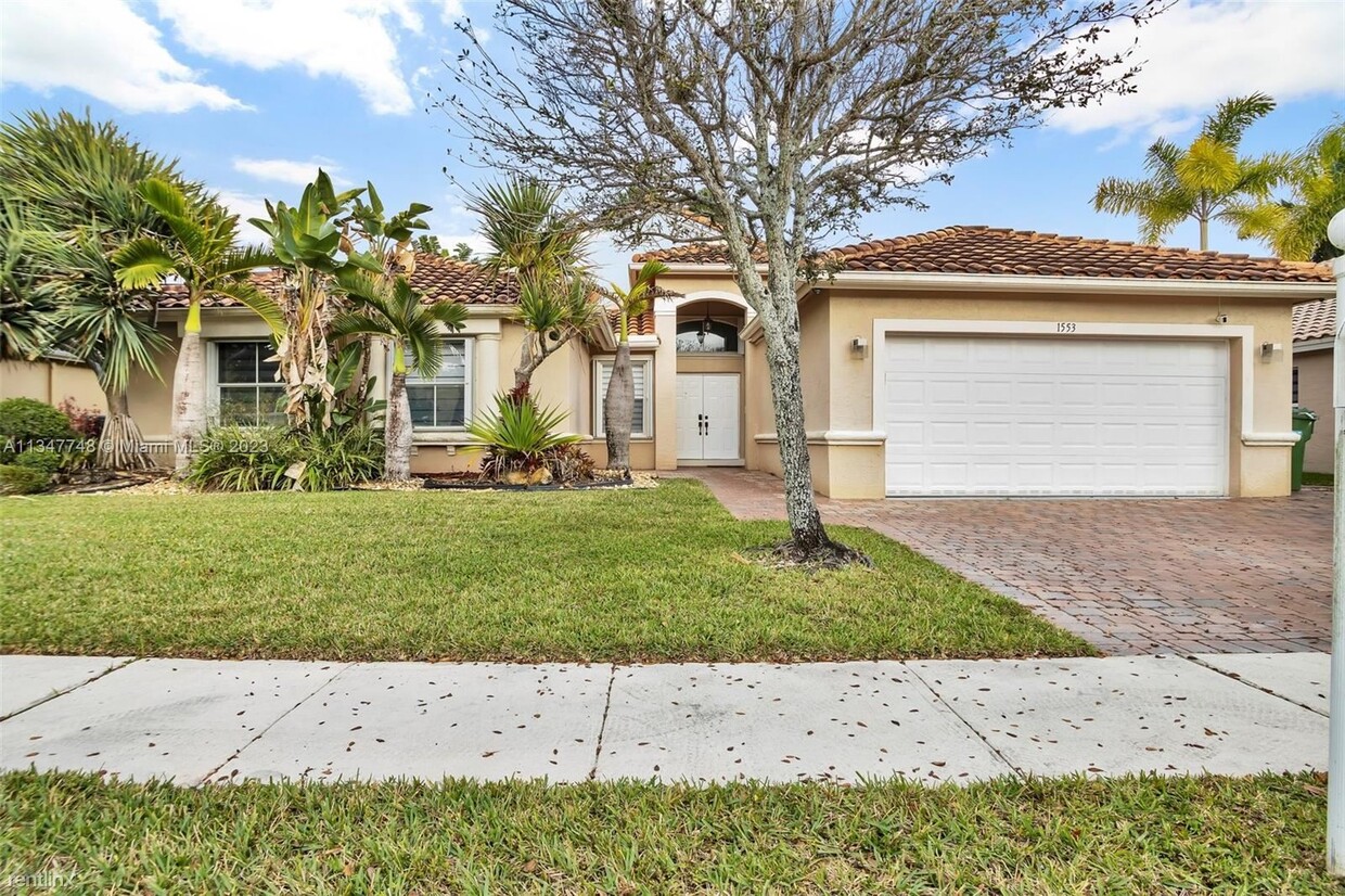 Foto principal - 4 br, 2.5 bath House - 1553 SW 189th Ave