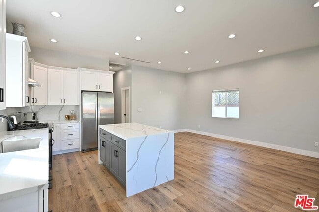 Building Photo - 6961 Balcom Ave